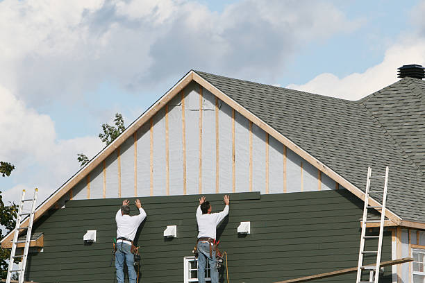 Professional Vinyl Siding technician working in Sparta, GA